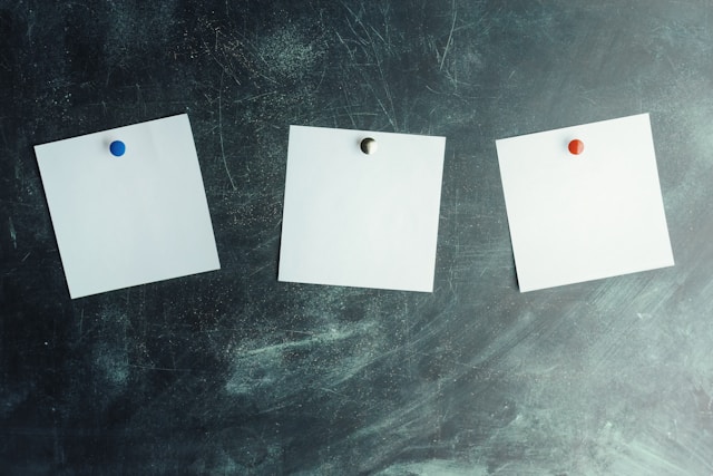 lists pinned to a wall